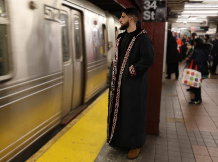 Nazwa coat at a New York subway station